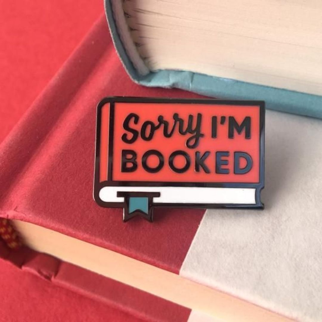 sorry-im-booked-hard-enamel-book-lapel-pin-coral-red