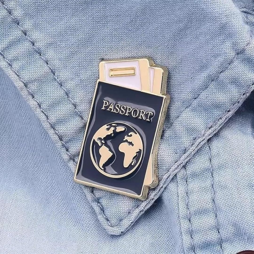 Passport enamel pin with navy cover gold globe and boarding pass cute travel lapel pin on collar