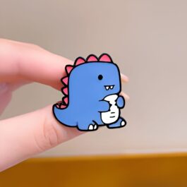 Baby Dino Enamel Pin – Cute Blue Dinosaur with Pink Spikes