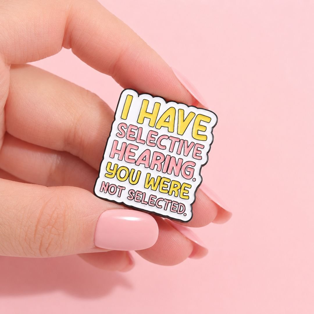 Colourful selective hearing quote enamel pin measuring approximately 2.3 × 2.6 cm.